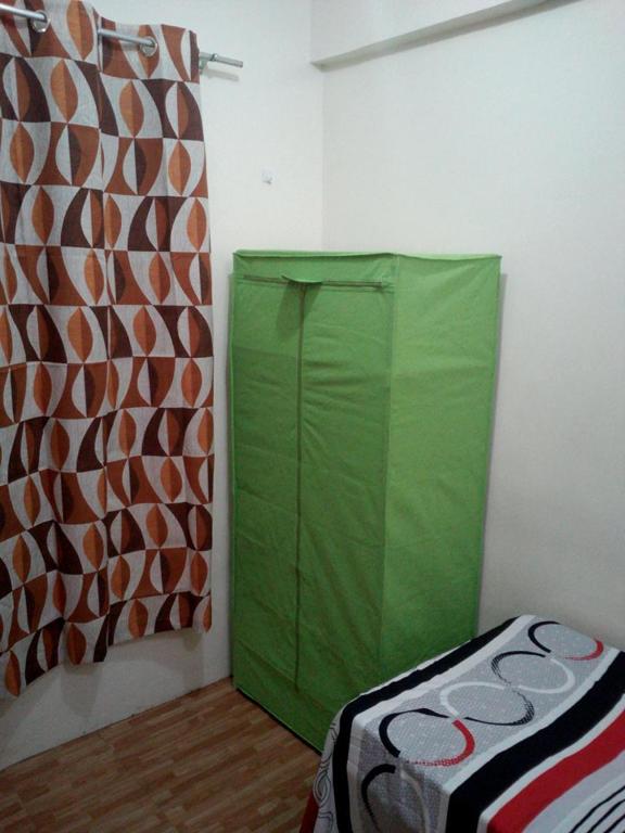 Letto o letti in una camera di Budget Studio Unit in Makati