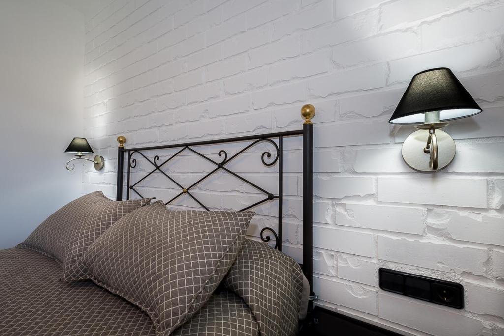 Postel nebo postele na pokoji v ubytování Hotel Montmar