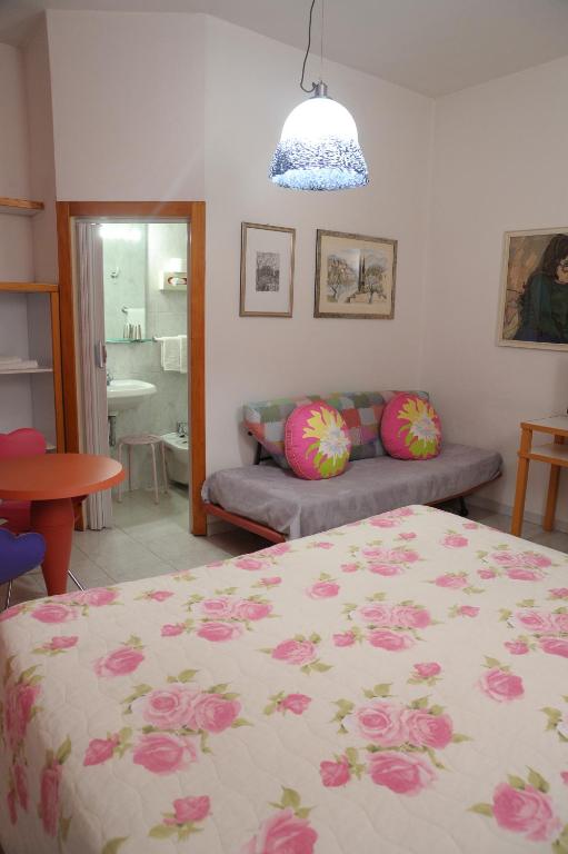 Postel nebo postele na pokoji v ubytování Hotel Il Falchetto