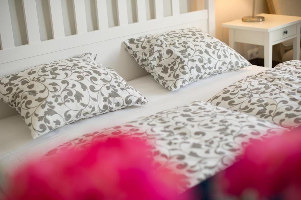 Posteľ alebo postele v izbe v ubytovaní Bródy Apartman