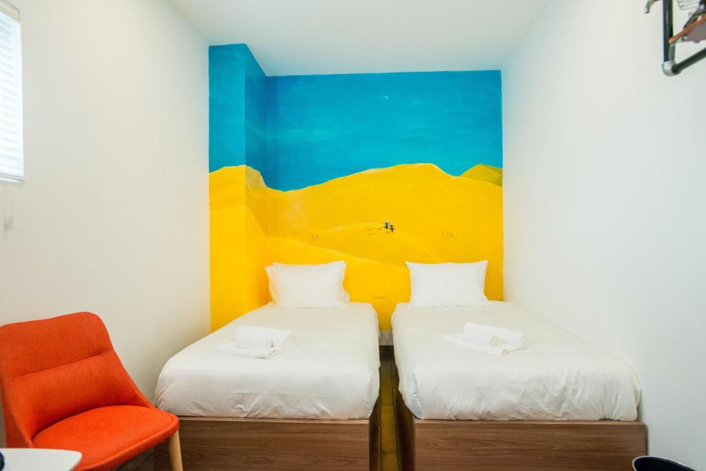 Postel nebo postele na pokoji v ubytování Nexy Hostel