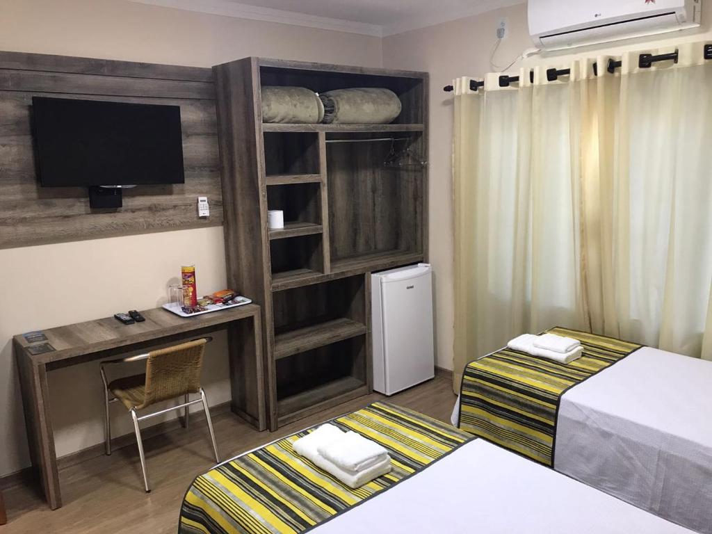 Postel nebo postele na pokoji v ubytování Open Hotel