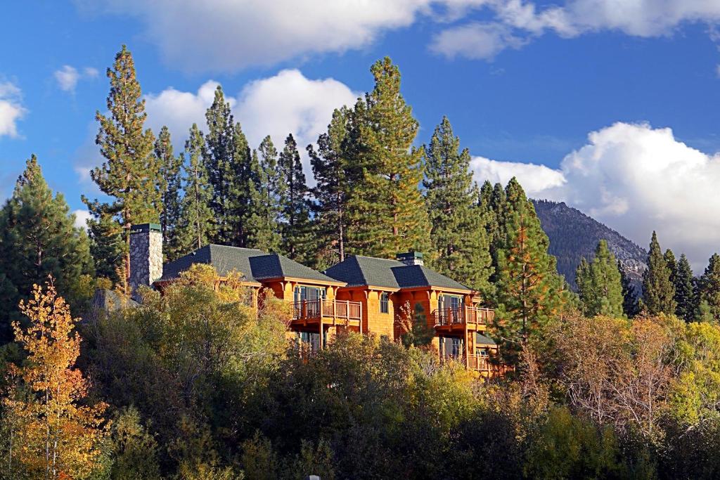 a large house in the middle of a forest at Hyatt Vacation Club at High Sierra Lodge in Incline Village