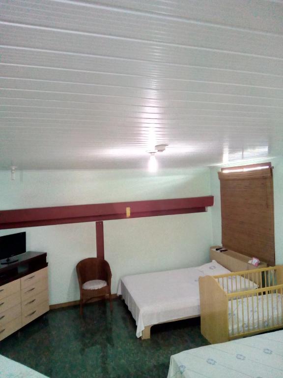 Postel nebo postele na pokoji v ubytování Cumbipar King Hotel