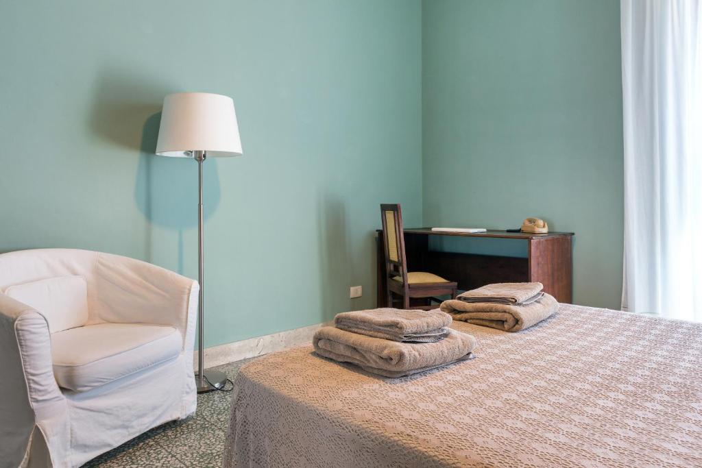 Łóżko lub łóżka w pokoju w obiekcie Alcalà Living Apartments