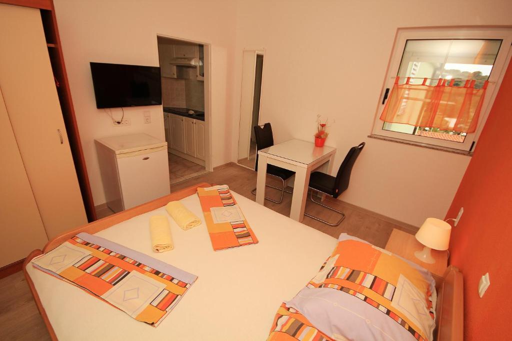 TV a/nebo společenská místnost v ubytování Apartment Vucic