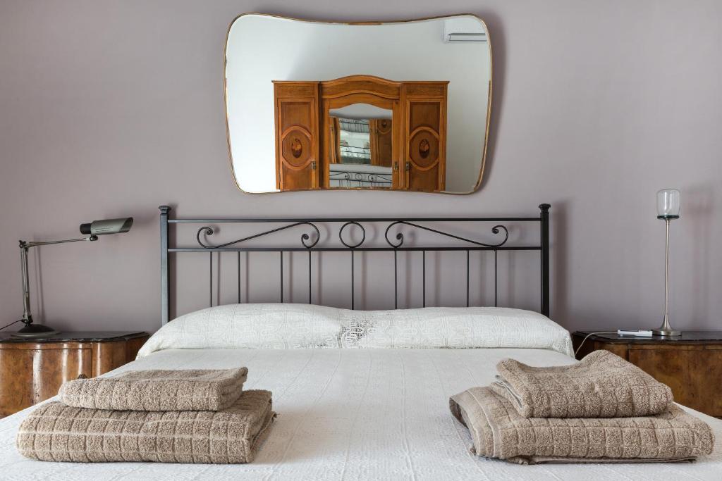Łóżko lub łóżka w pokoju w obiekcie Alcalà Living Apartments