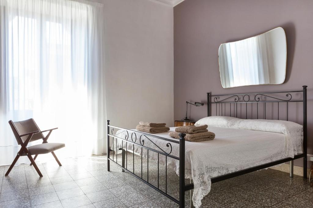 Łóżko lub łóżka w pokoju w obiekcie Alcalà Living Apartments