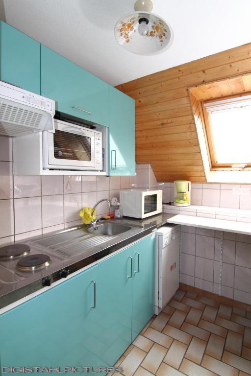Kuchyň nebo kuchyňský kout v ubytování Gîte à La Montagne
