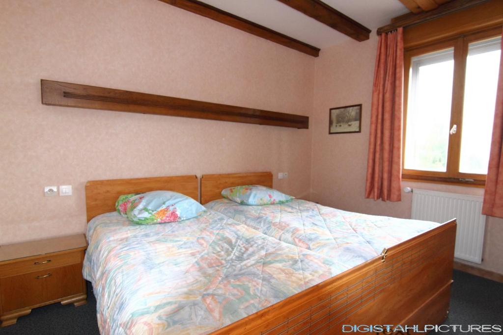 Postel nebo postele na pokoji v ubytování Gîte à La Montagne