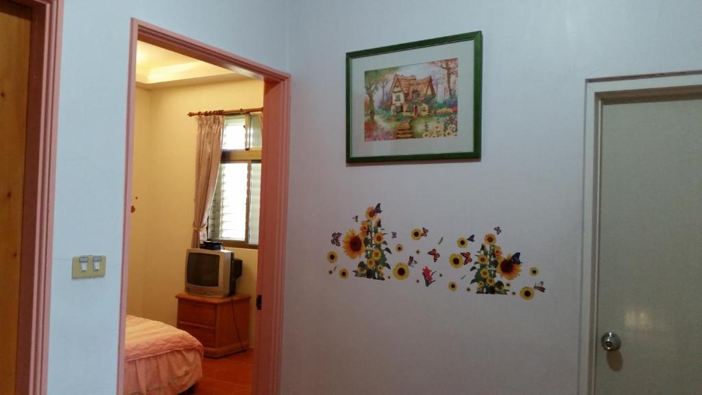 Postel nebo postele na pokoji v ubytování Yilan Xiang Feng Homestay