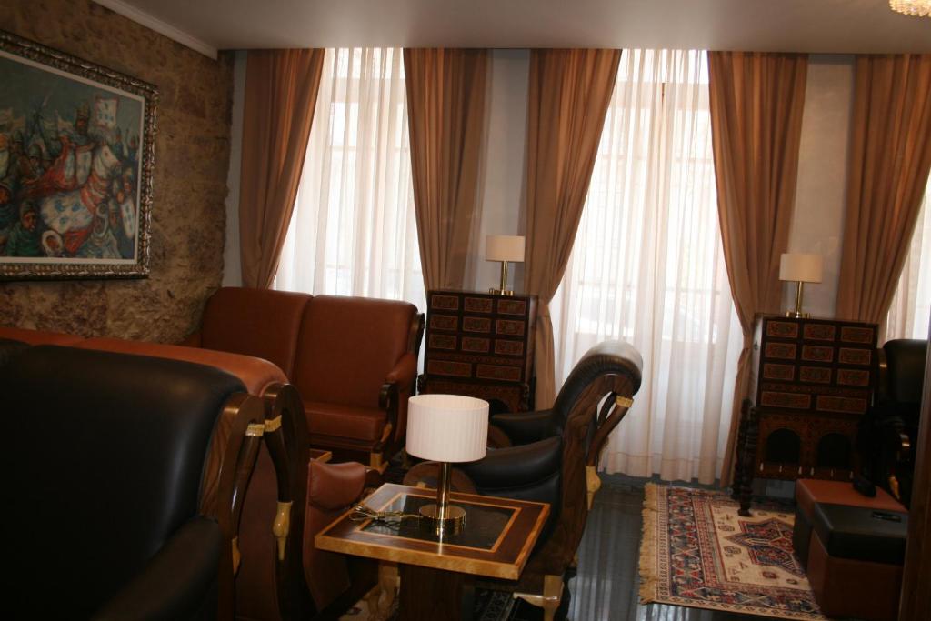 Posezení v ubytování Hotel Ibn-Arrik