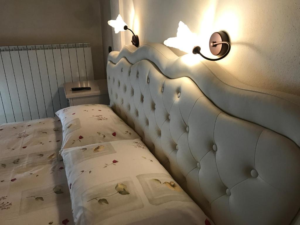 Postel nebo postele na pokoji v ubytování Locanda La Posta Nöa - B&B