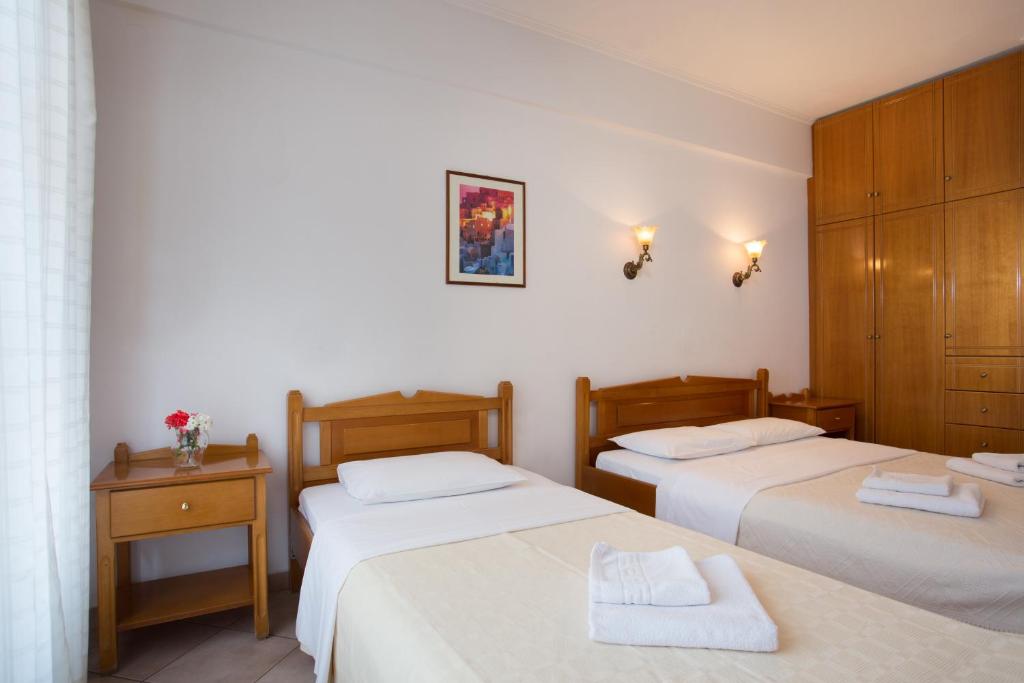 Postel nebo postele na pokoji v ubytování Petrino Guesthouse