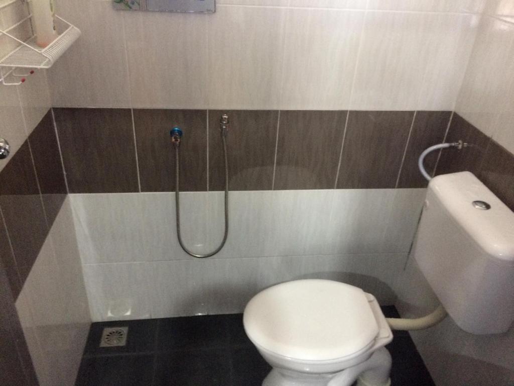 Koupelna v ubytování Roomstay Zulmi