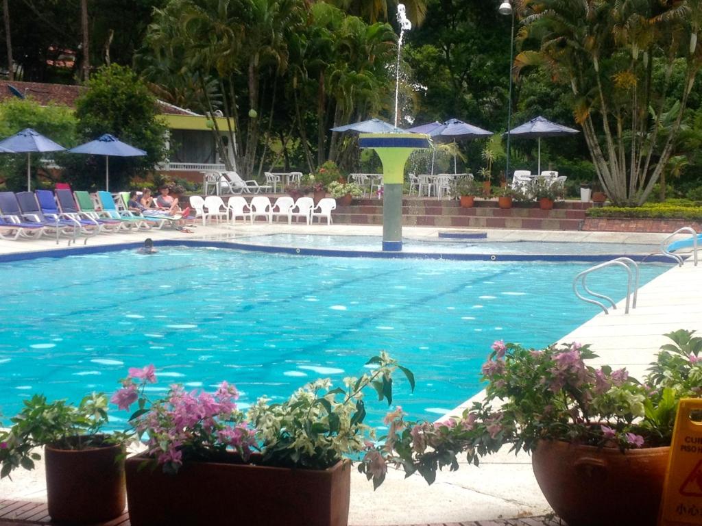 Πισίνα στο ή κοντά στο Hotel Hacienda El Diamante