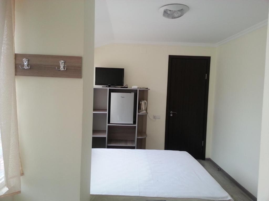 Postel nebo postele na pokoji v ubytování Ureki GuestHouse