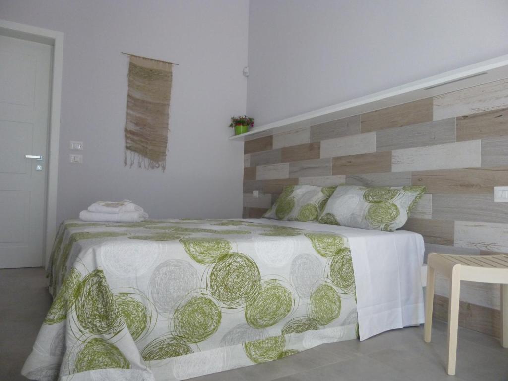 Postel nebo postele na pokoji v ubytování B&B Le Thuje