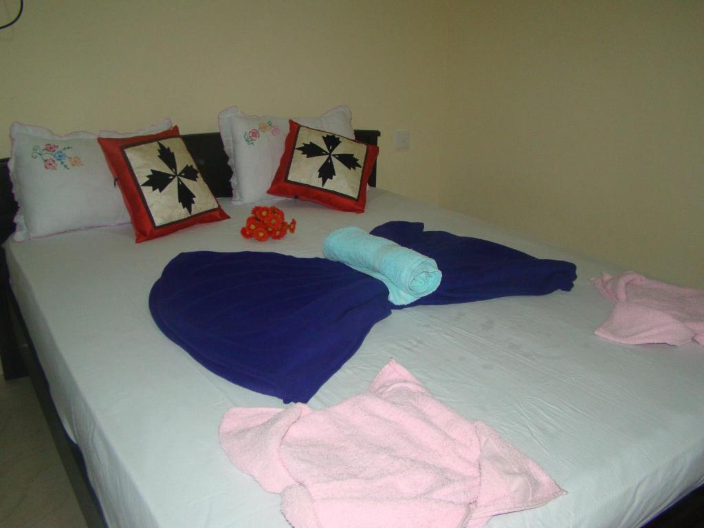 Postel nebo postele na pokoji v ubytování Serenity Homestay