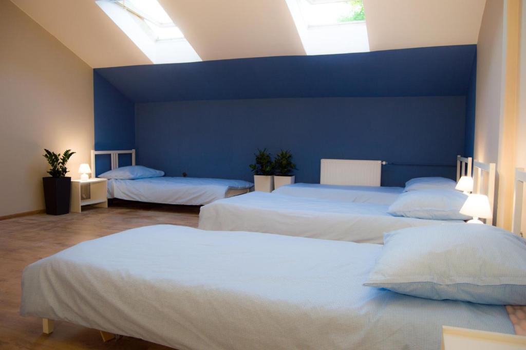 Postel nebo postele na pokoji v ubytování Smart Stay Hostel Gdynia