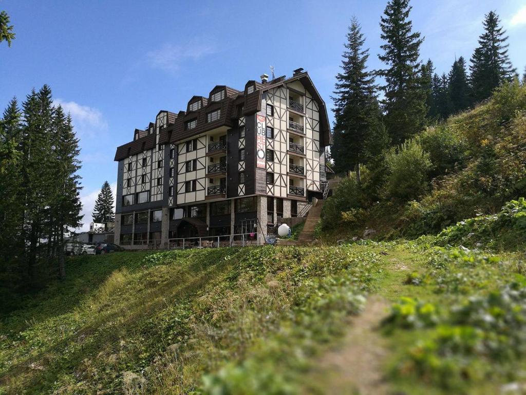 a large building on top of a hill at Hotel Lavina in Jahorina