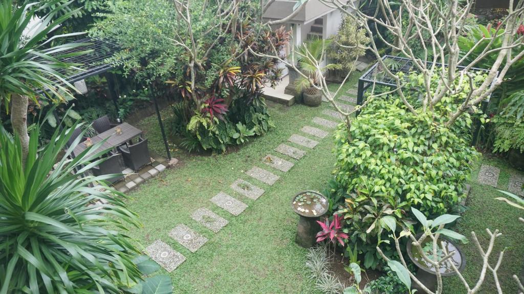 an aerial view of a garden with plants at Puri Cantik in Ubud