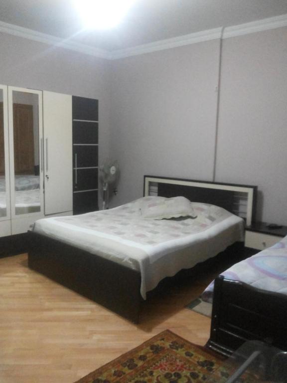 Postel nebo postele na pokoji v ubytování Guesthouse Zeinabi