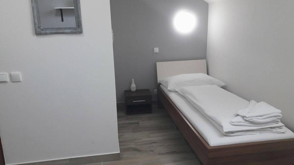 Postel nebo postele na pokoji v ubytování Hotel Golf Bitozeves