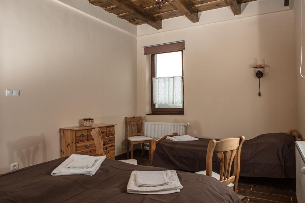 Postel nebo postele na pokoji v ubytování Csaronda Vendegház