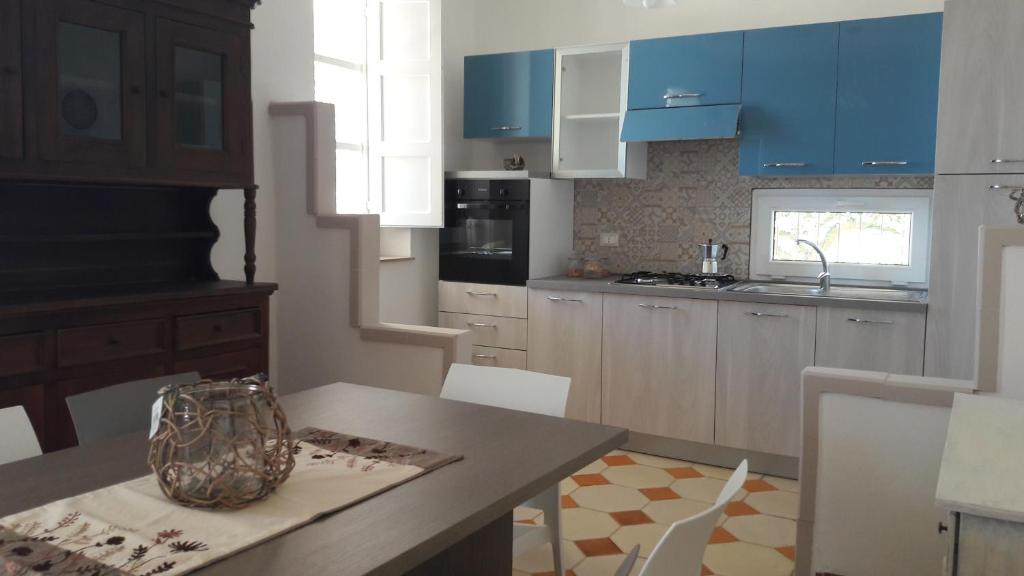 Kuchyňa alebo kuchynka v ubytovaní Casa Vacanze Reginotte