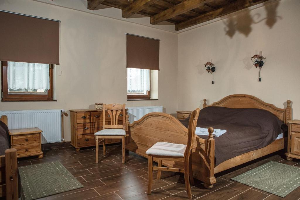 Postel nebo postele na pokoji v ubytování Csaronda Vendegház