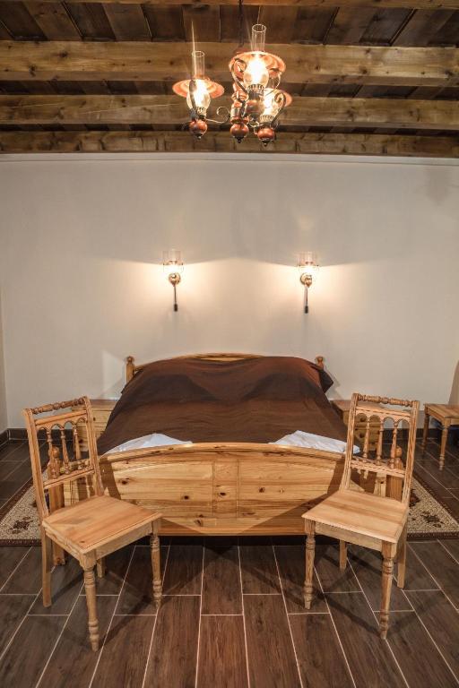 Postel nebo postele na pokoji v ubytování Csaronda Vendegház