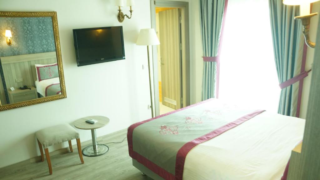 TV a/nebo společenská místnost v ubytování Dab Hotel