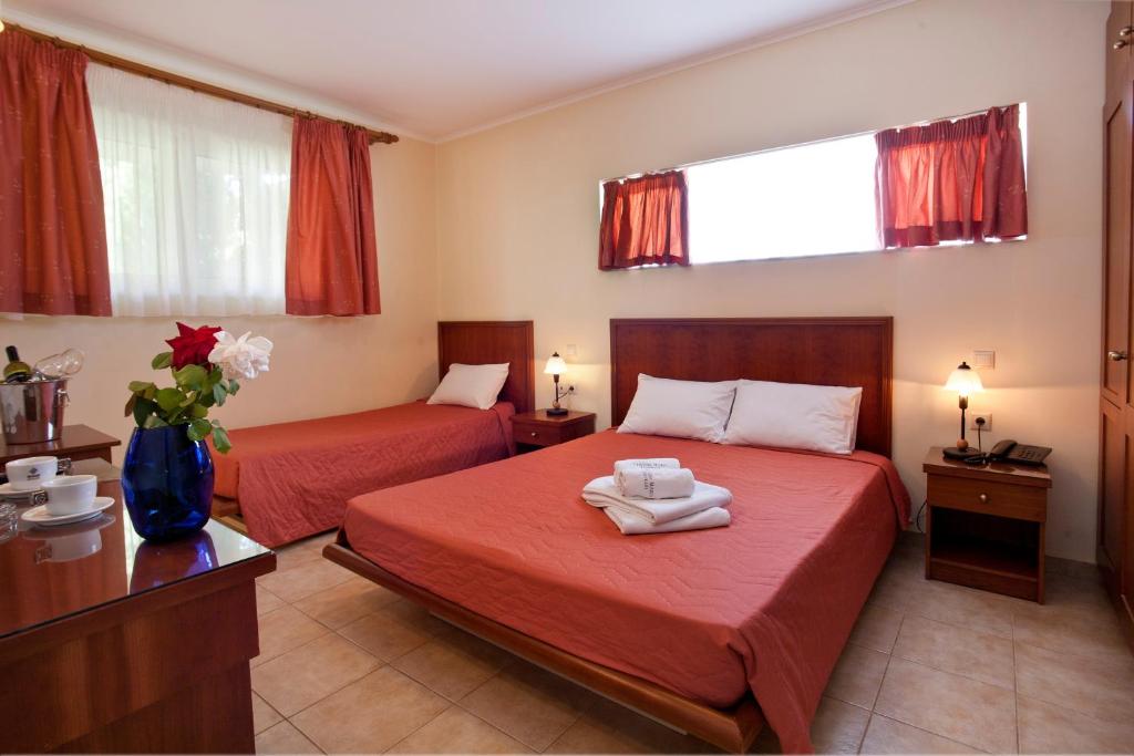 Postel nebo postele na pokoji v ubytování Hotel Cristina Maris