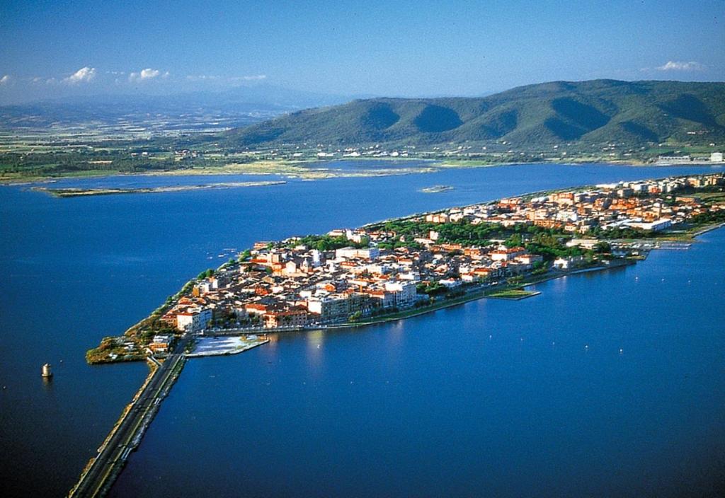 an island in a large body of water at B&B Corso Italia 58 in Orbetello