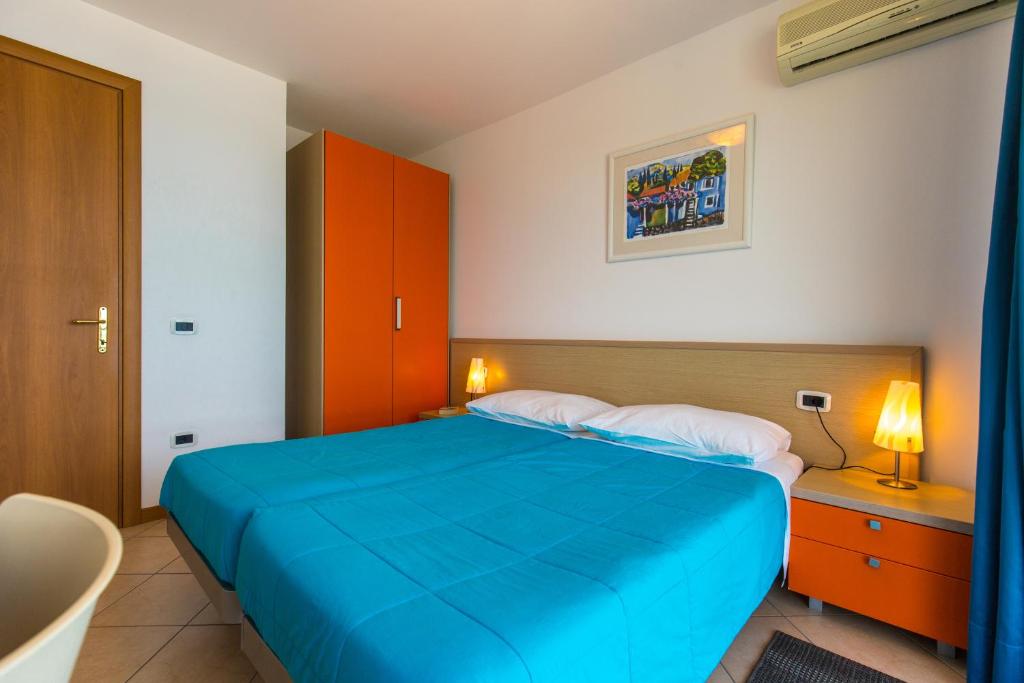 Postel nebo postele na pokoji v ubytování Splendid Resort