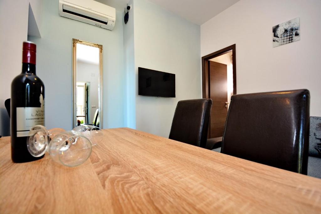Telewizja i/lub zestaw kina domowego w obiekcie Apartments Clara