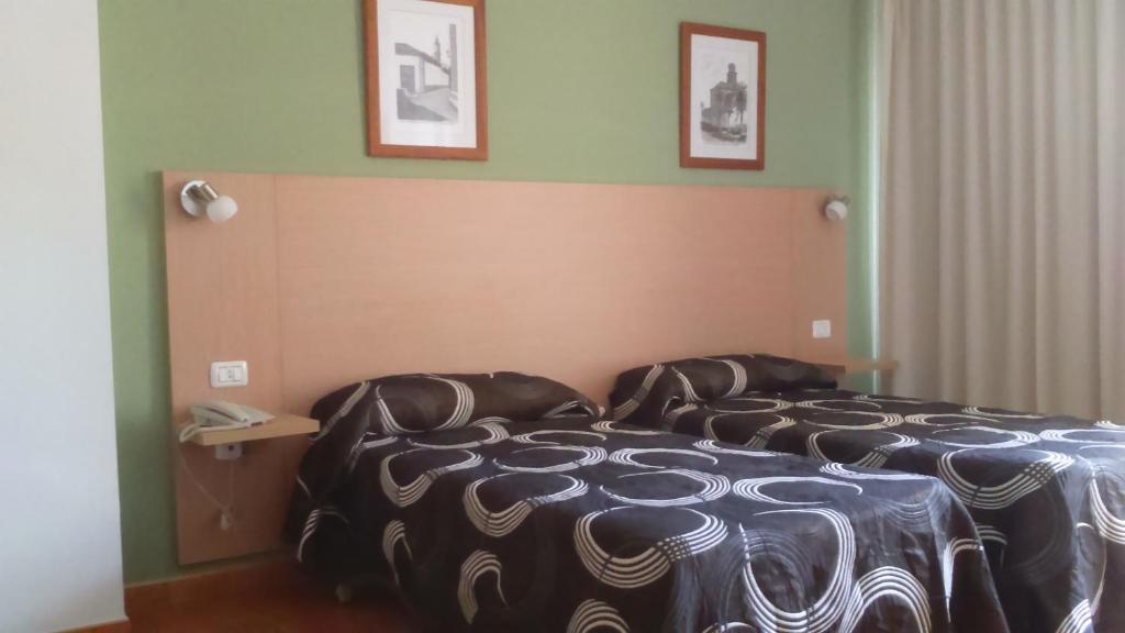 Postel nebo postele na pokoji v ubytování Hotel Ucanca