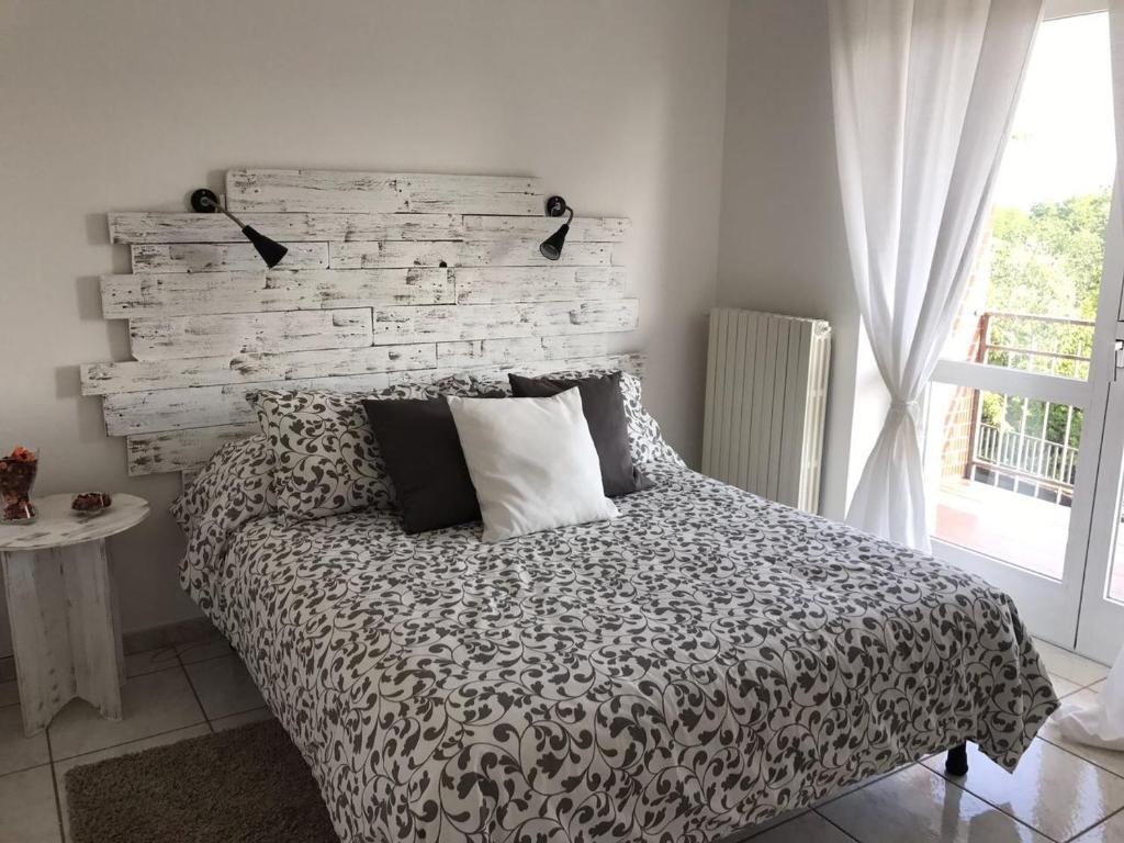 Postel nebo postele na pokoji v ubytování Carpe Diem