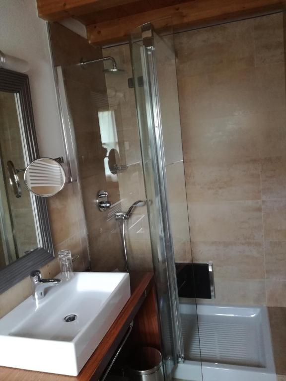 Koupelna v ubytování Hotel Bait de Angial