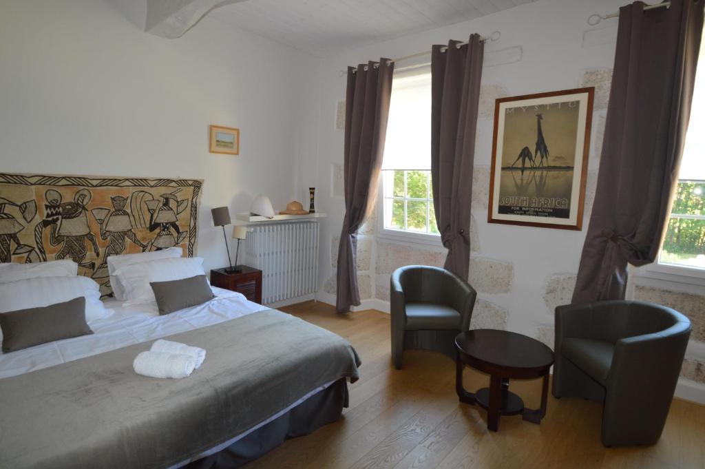 Postel nebo postele na pokoji v ubytování Moulin De Jouenery Et Spa