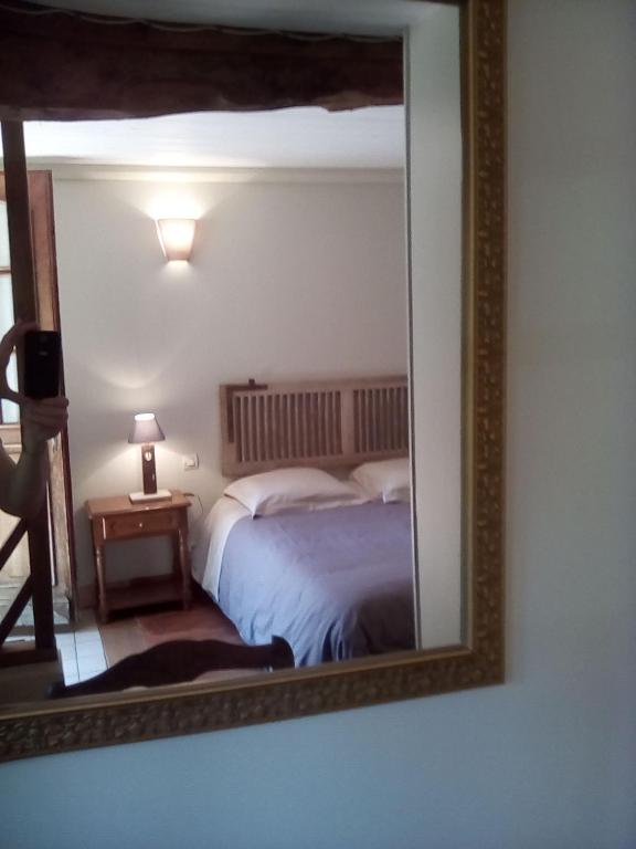 Postel nebo postele na pokoji v ubytování La Ferme Des Vignes