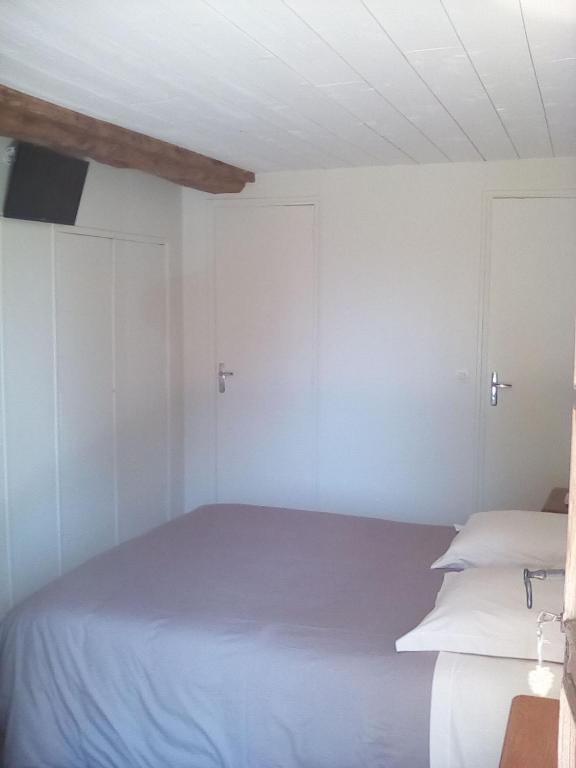 Postel nebo postele na pokoji v ubytování La Ferme Des Vignes
