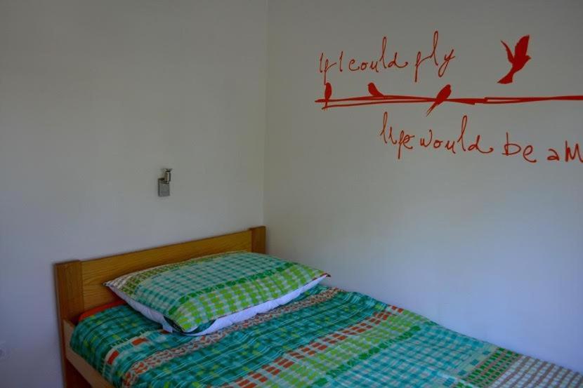 Кровать или кровати в номере Sweet home in Ljubljana