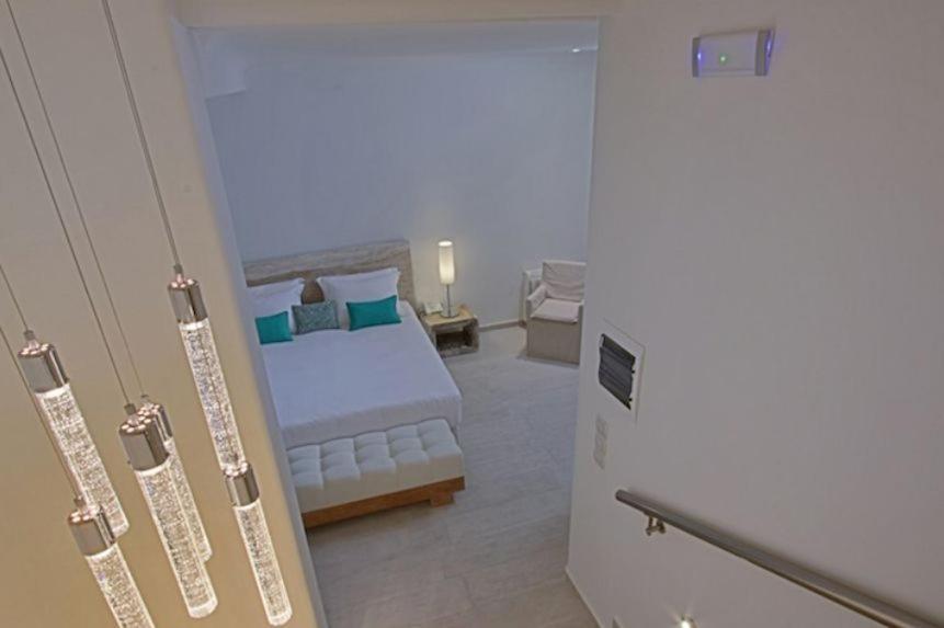 Letto o letti in una camera di Allure Suites
