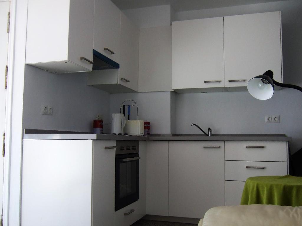 Kuchyňa alebo kuchynka v ubytovaní Beachfront Apartment