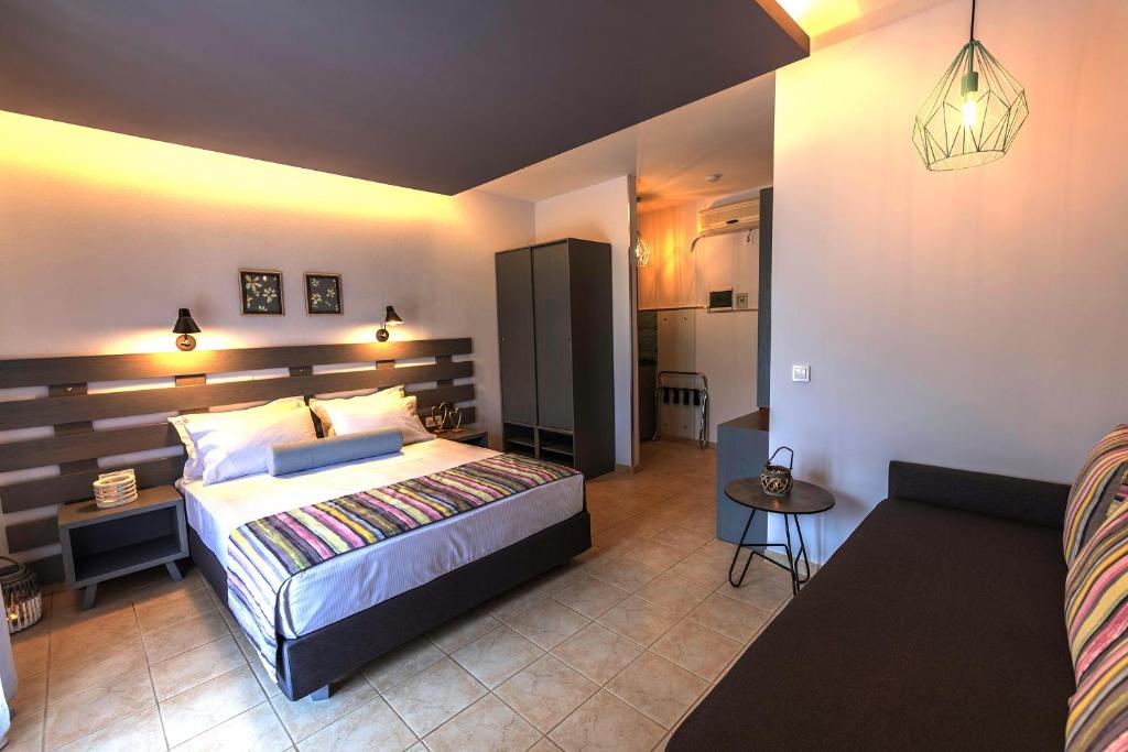 Posteľ alebo postele v izbe v ubytovaní Aliston Hotel Thassos