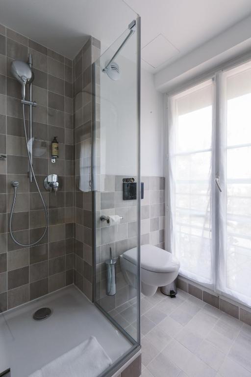 Koupelna v ubytování Le Petit Cosy Hôtel