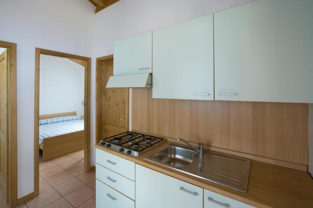 Kuchyň nebo kuchyňský kout v ubytování Camping Village Oasi