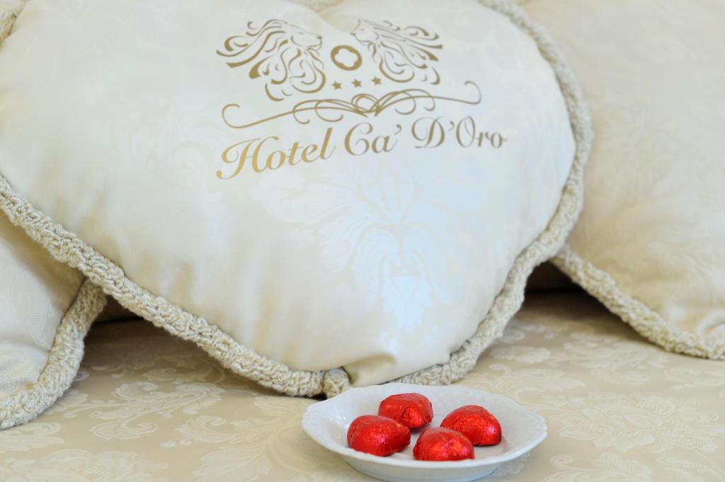 Кровать или кровати в номере Hotel Ca' D'Oro Tre Stelle Superior Adults only